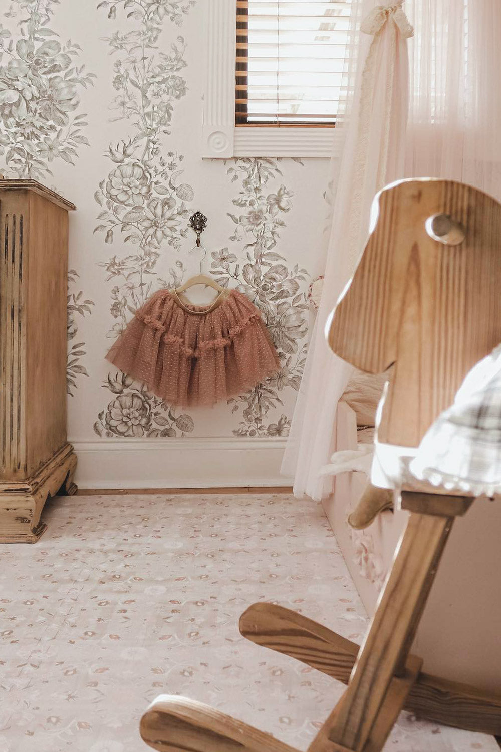 vintage girls bedroom with traditional wallpaper