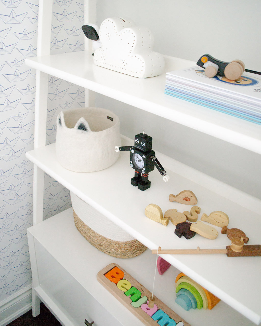 White nursery interior with coastal style and paper boats removable wallpaper