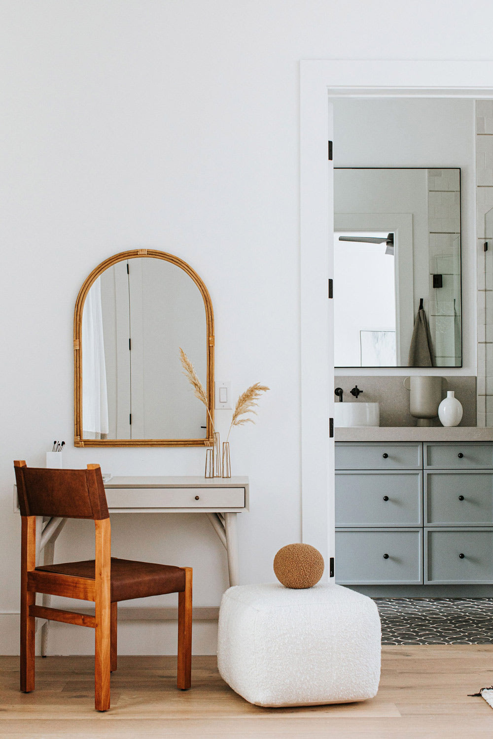 Boho bedroom design featuring neutral removable wallpaper