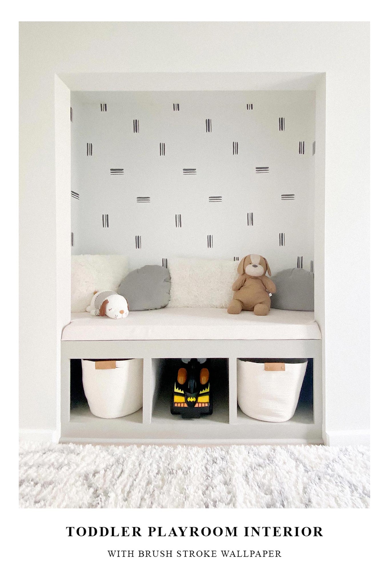 Toddler playroom interior inspiration with minimal brush stroke removable wallpaper in closet reading nook
