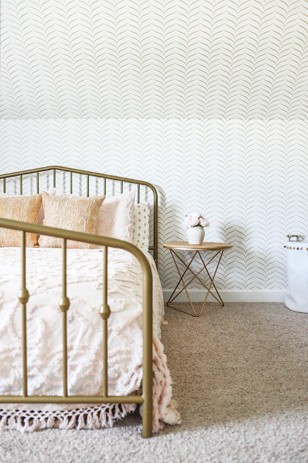 DIY bedroom remodel featuring faux gold removable wallpaper design