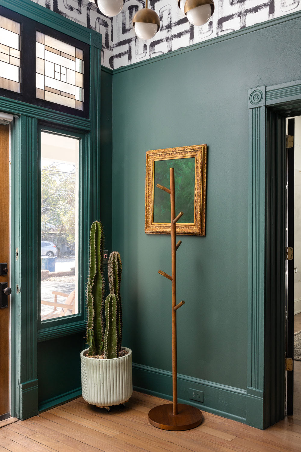 Abstract, removable wallpaper in forest green entryway