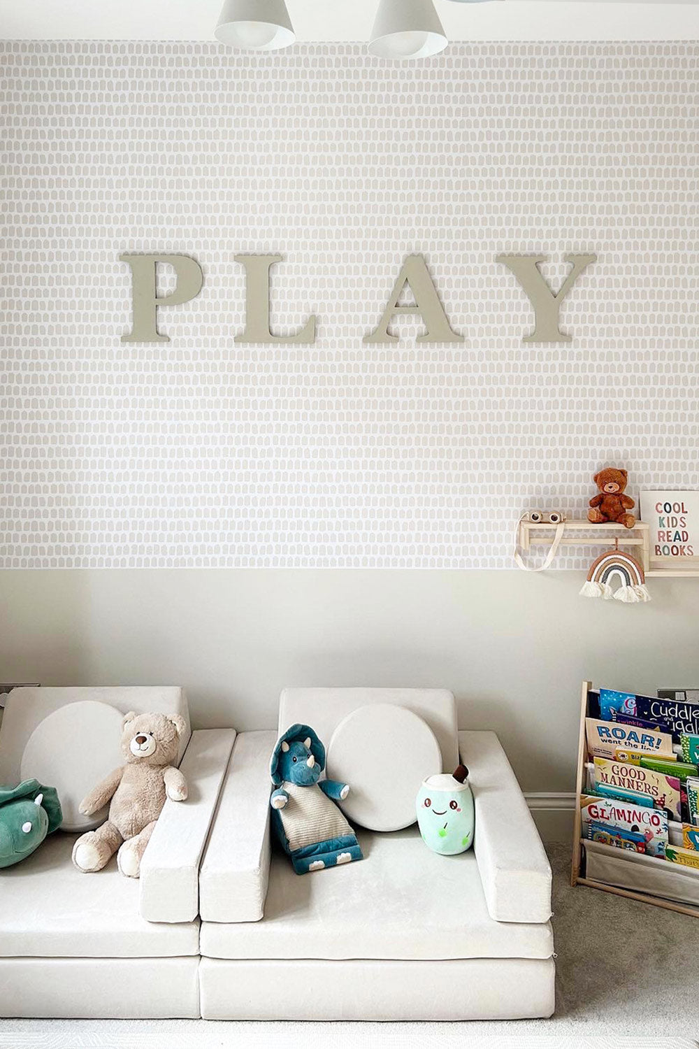 Neutral kids playroom interior with removable wallpaper design