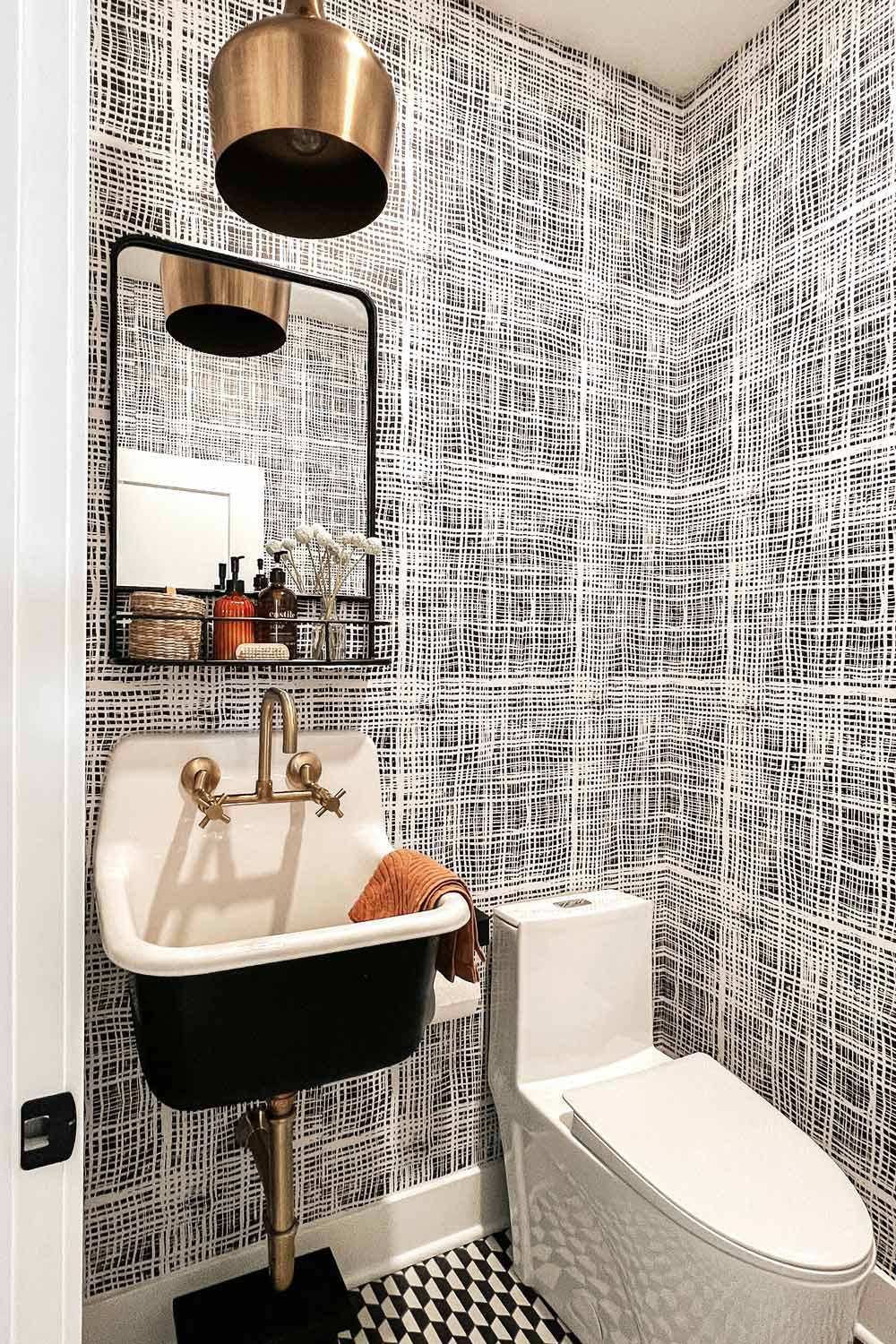 Black and White wallpaper design in small bathroom