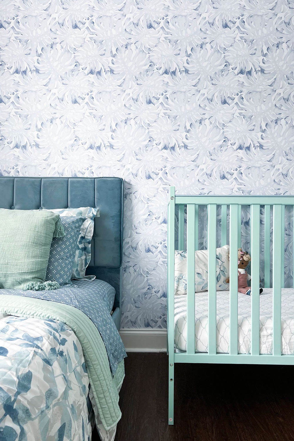 Baby nursery design featuring removable wallpaper