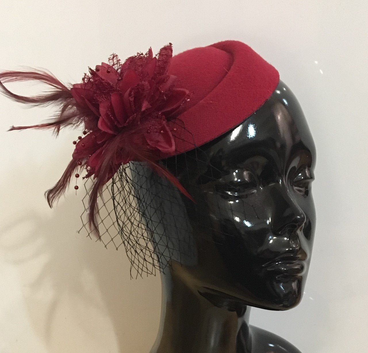 black and burgundy fascinator