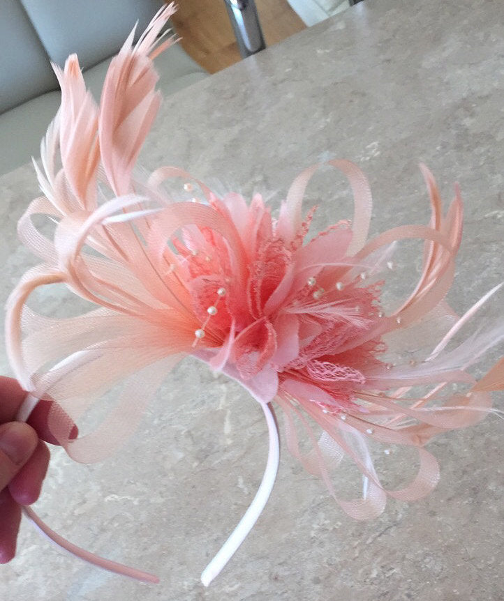 peach coloured fascinators