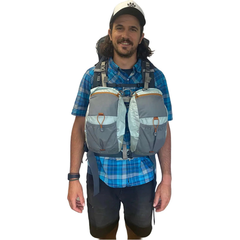 A person is wearing the Universal Balance Bags.