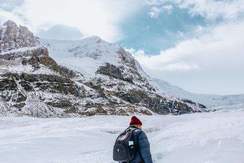 A person hiking in snowy terrain