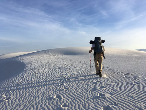 A person hiking in a desert