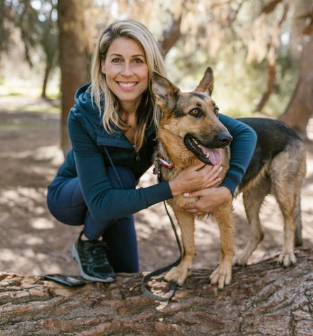 A hiker with her dog