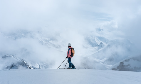 A skier on a snow-covered mountain