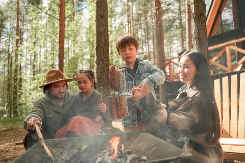 A family cooking on an outdoor camping trip