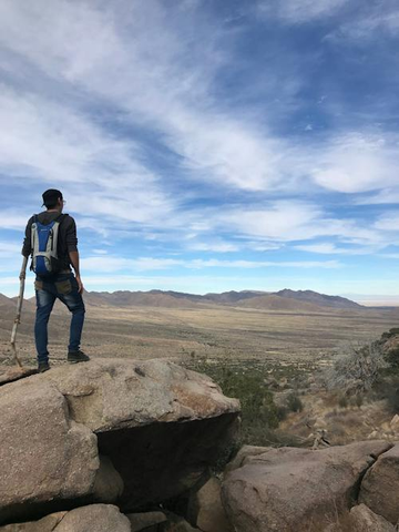 a person on a hike in the mountains