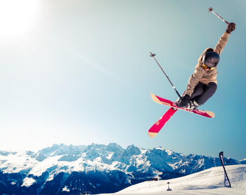 Person doing a ski blade trick.