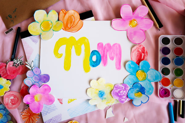 more flowers surrounding the mom canvas board