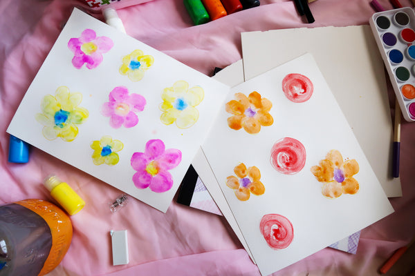 watercolor painted flowers on paper