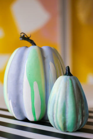 Two White Painted Pumpkins