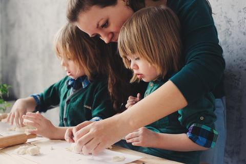 Cooking with twins - teething jewelry