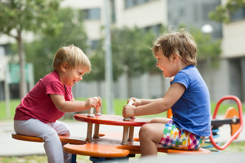 teething necklace for mom taking turns at playground