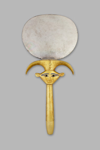  The handle is decorated with the emblem of the goddess Hathor. The mirror was found in the bottom of a coffin discovered in the tomb of Hatnefer (36.3.1). 