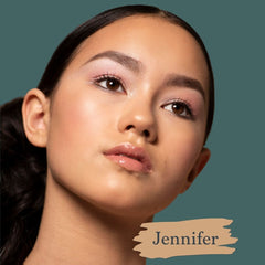 Golden tan medium skin model wearing Jennifer foundation shade for Essential natural foundation