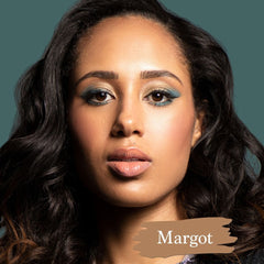 Dark skin model actress Margot Bingham wearing Margot foundation shade for Essential natural foundation