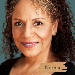 Mature skin model makeup artist Norma Patton-Lowin wearing Norma foundation golden caramel shade for Essential natural foundation