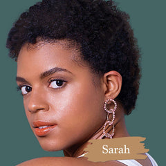 Best mineral foundation for natural makeup look on dark skin model with shade swatch and name