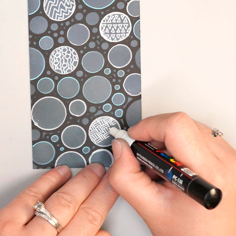 Nadine Milton Adding Patterns to Stenciled Circles using Posca Paint Pen
