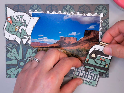 Arranging Elements Cut from Wild Whisper Designs Road Trip Collection onto a Card