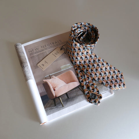 Sandy Eclipse Tie next to an Interior in Elle Dec