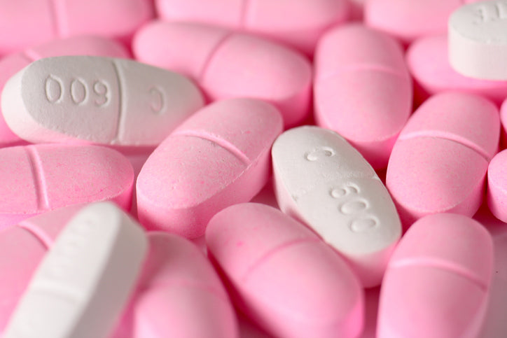 Calcium tablets, pink and white