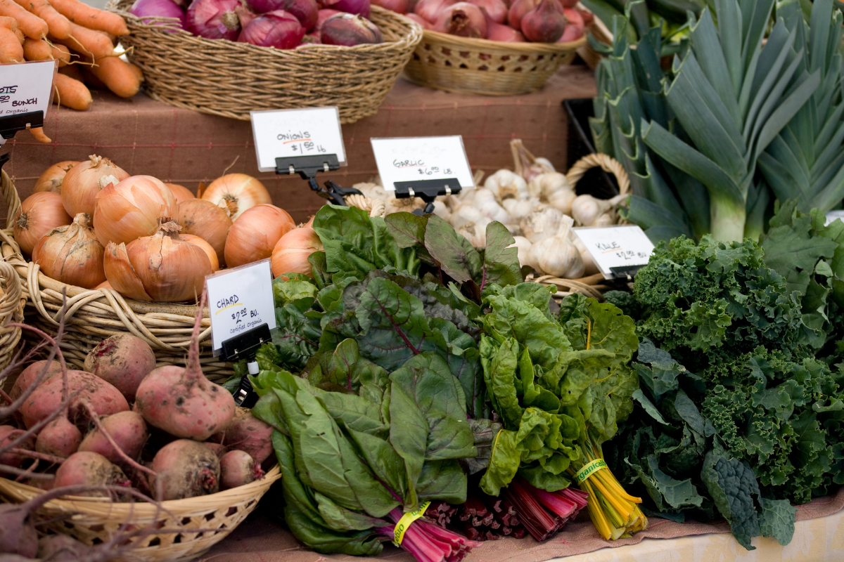 farmers market leafy greens and root veggies