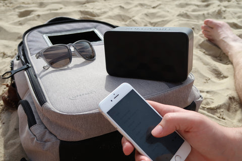 Solarbank playing music, iPhone fully charged, Lifepack in the sand camping