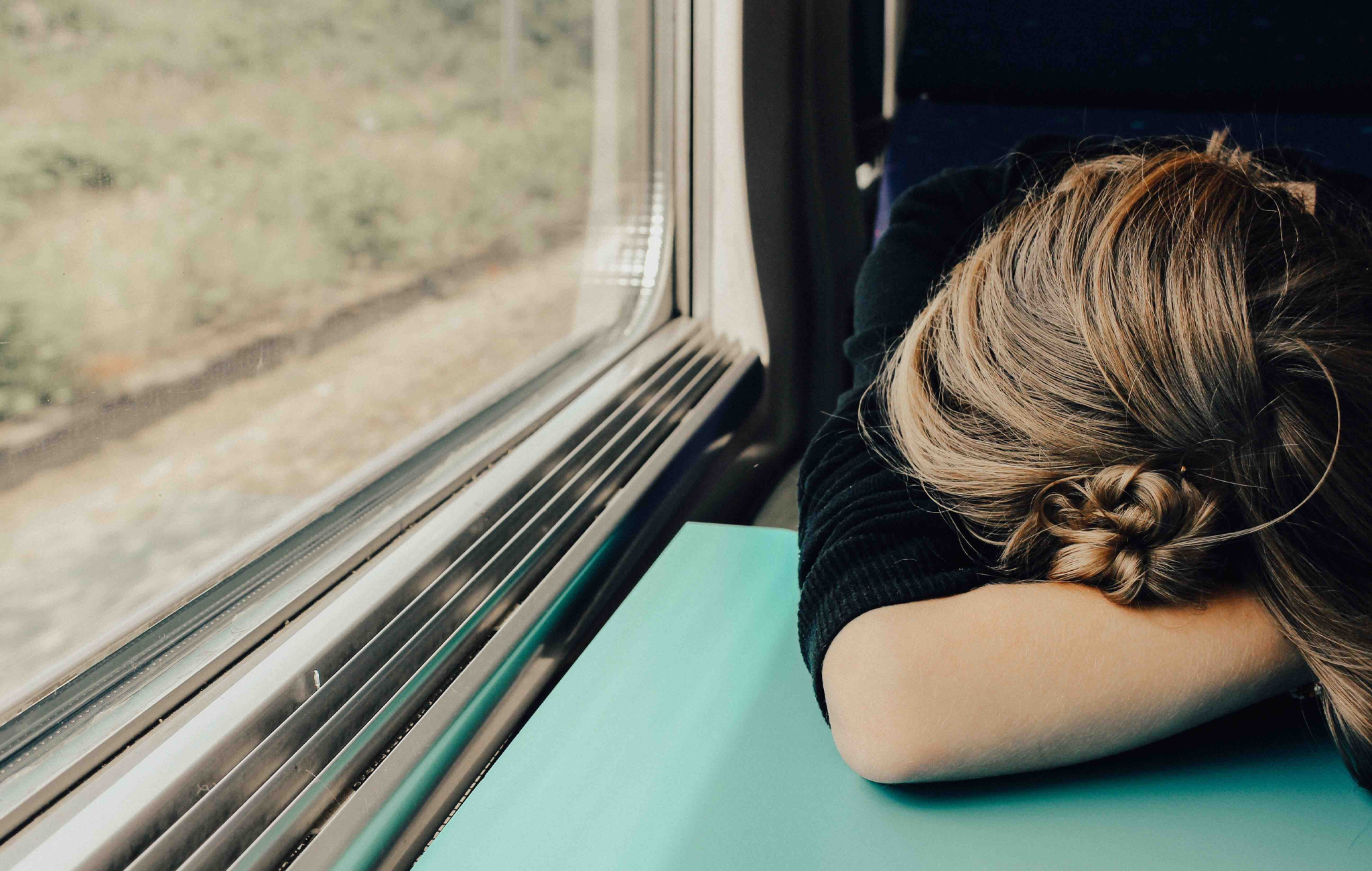 girl sleeping in train
