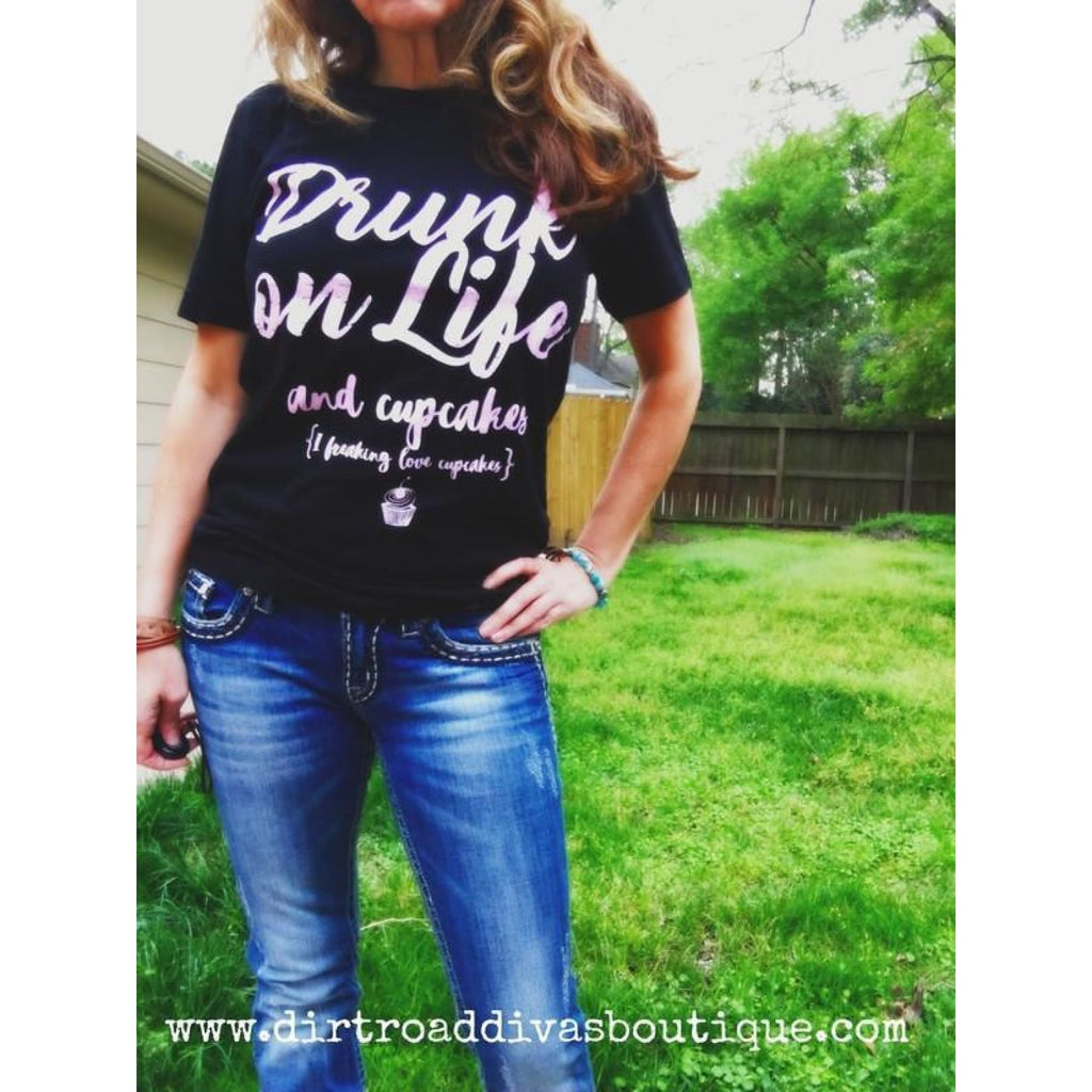 https://cdn.shopify.com/s/files/1/1571/3715/products/drunk-on-life-cupcakes-s-graphic-tee-top-dirt-road-divas-boutique-clothing-t-shirt-jeans_189_1024x.jpg?v=1571439411