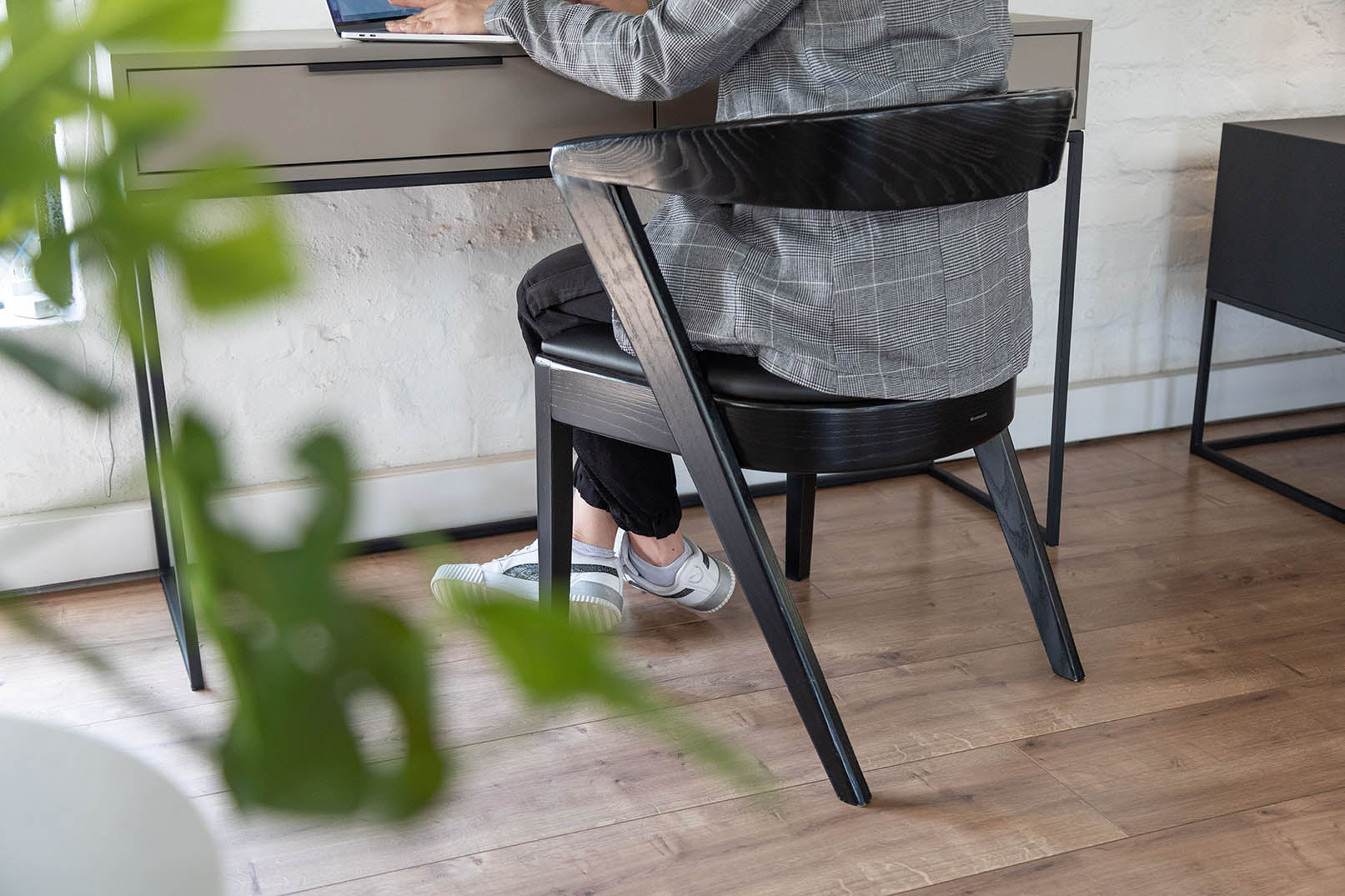 Woodbender chair at a workstation. Woodbender chairs and bar stools are available via Sarza furniture store in Rye, New York.