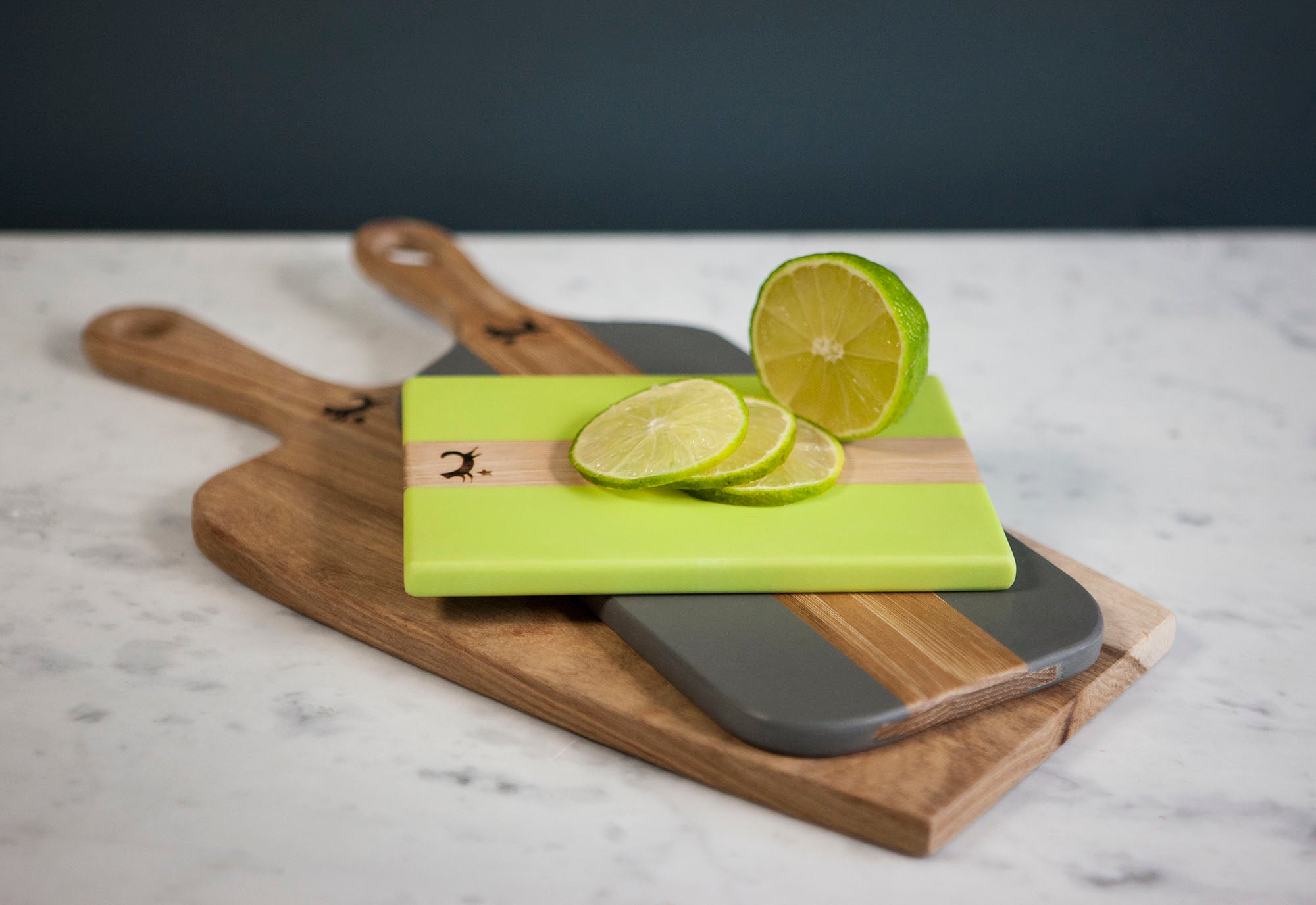 A selection of Coco Africa kitchenware wooden boards, all created from solid wood. Coco Africa wooden home décor products are available at Sarza home goods and furniture store in Rye New York
