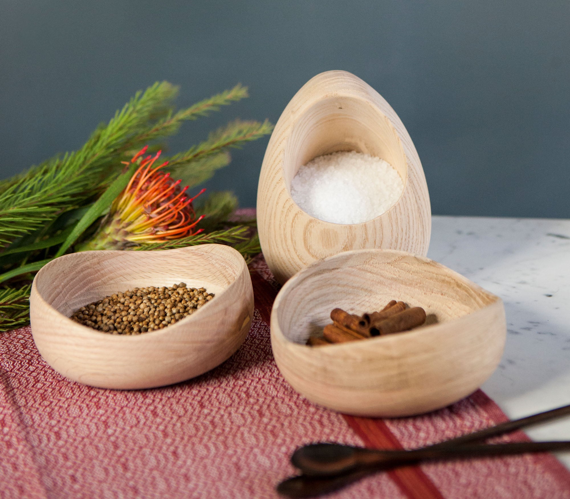 A selection of Coco Africa kitchenware pinch pots for salt and pepper. Coco Africa wooden home décor products are available at Sarza home goods and furniture store in Rye New York