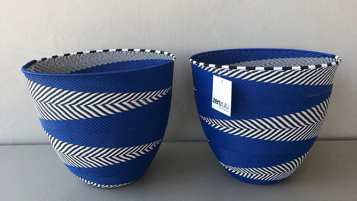 Image of ZenZulu blue and white woven baskets as home décor products. ZenZulu baskets, plates and vessels are available at Sarza home goods and furniture store in Rye New York.