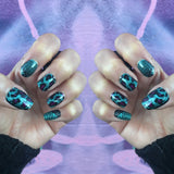 Green glitter nail art, leopard nail design