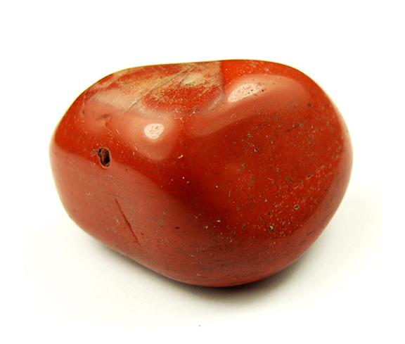 Close Up Of A Piece Of Polished Red Jasper Isolated On A White Background  Stock Photo, Picture And Royalty Free Image