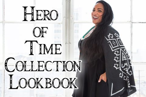 Hero of Time Collection - Tas (a medium-dark skinned, dark haired model) wears a cape sleeved cardigan from our Hero of Time Collection, inspired by the story of a hero and a princess.