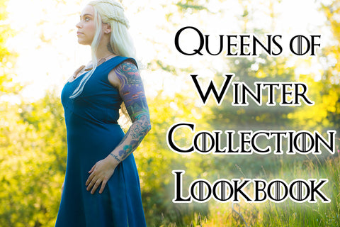 Queens of Winter Collection Lookbook - Melanie (a light skinned model wearing a white blonde wig) models a blue dress from the Queen of Winter Collection inspired by queens sitting on thrones of swords.