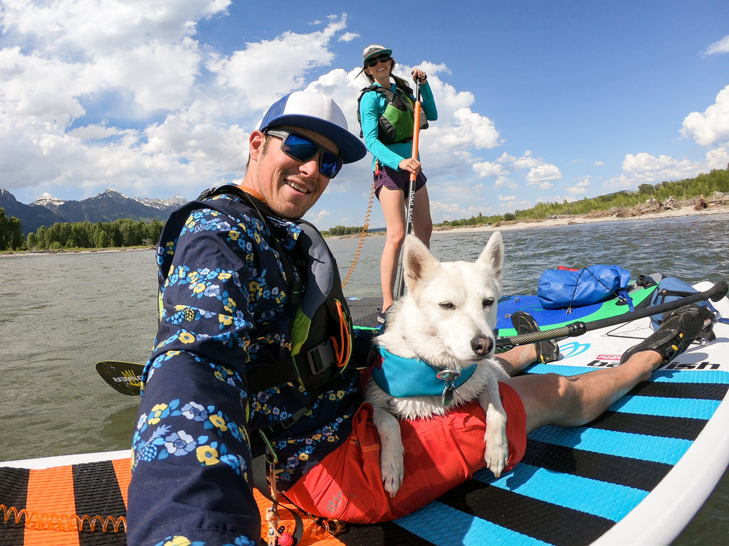 Becca and Cade go paddleboarding with dog, Tala.