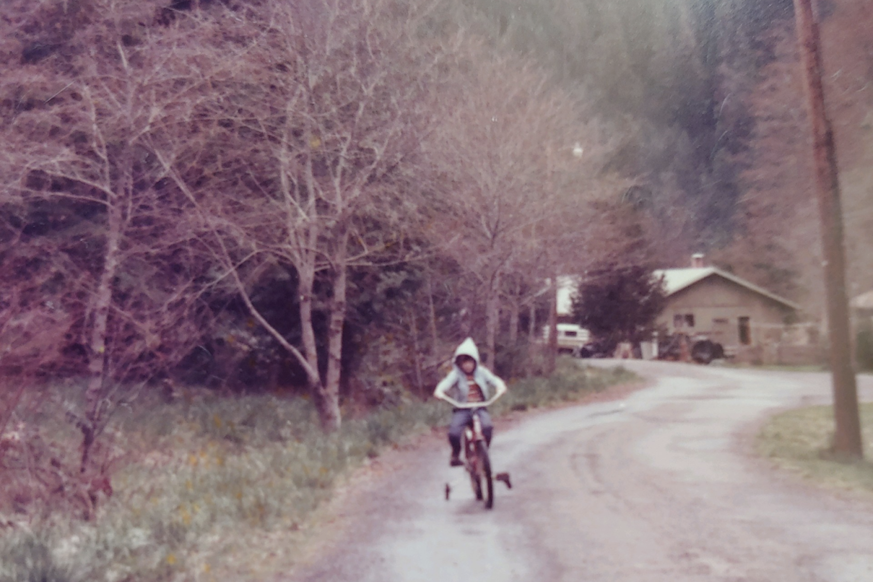 Dove as a child on a bike in Southern Oregon.