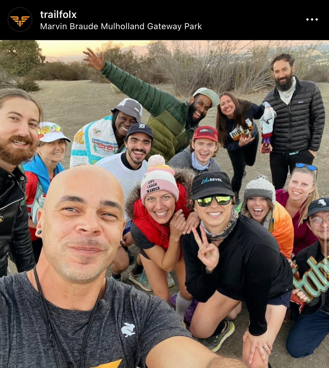 Instagram post from Trail Folx showing a selfie group shot of a running group