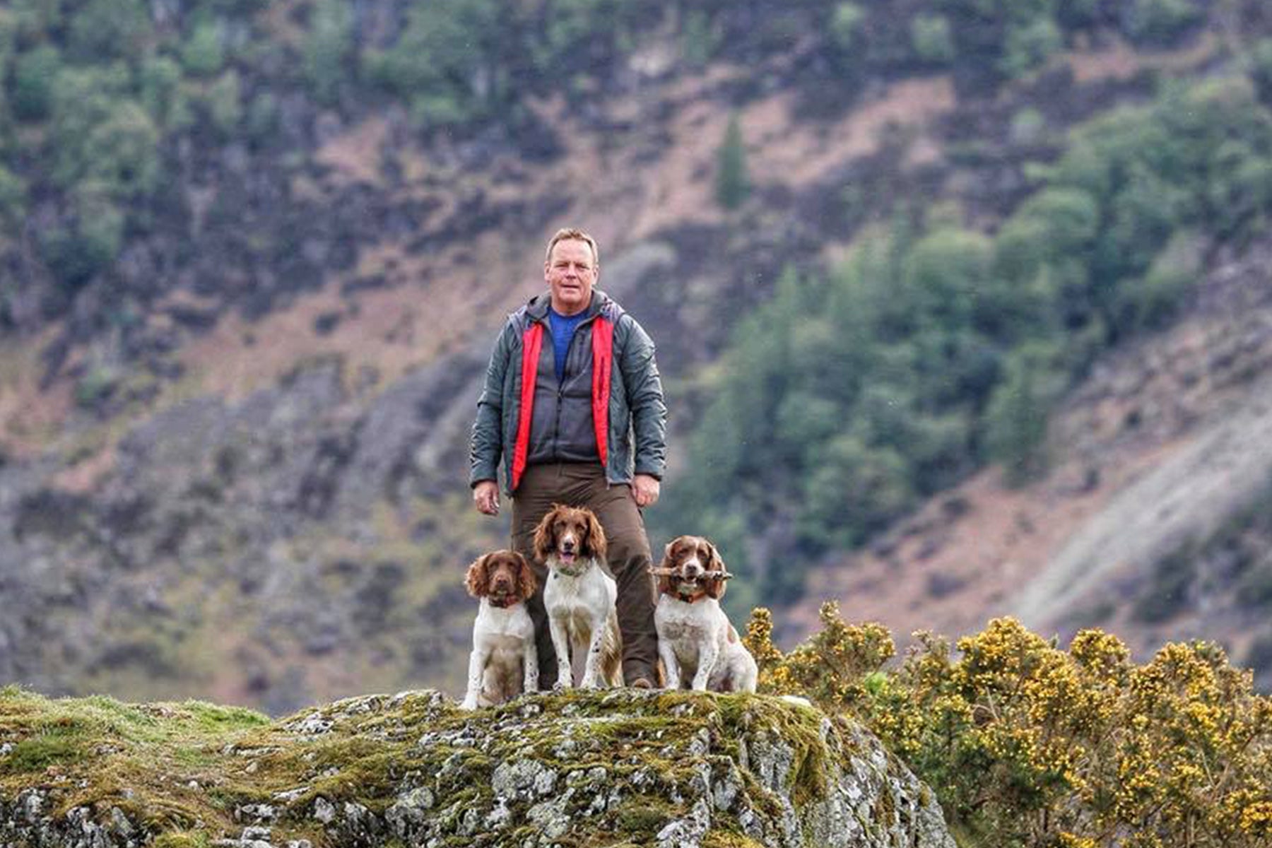 Kerry and his three dogs.