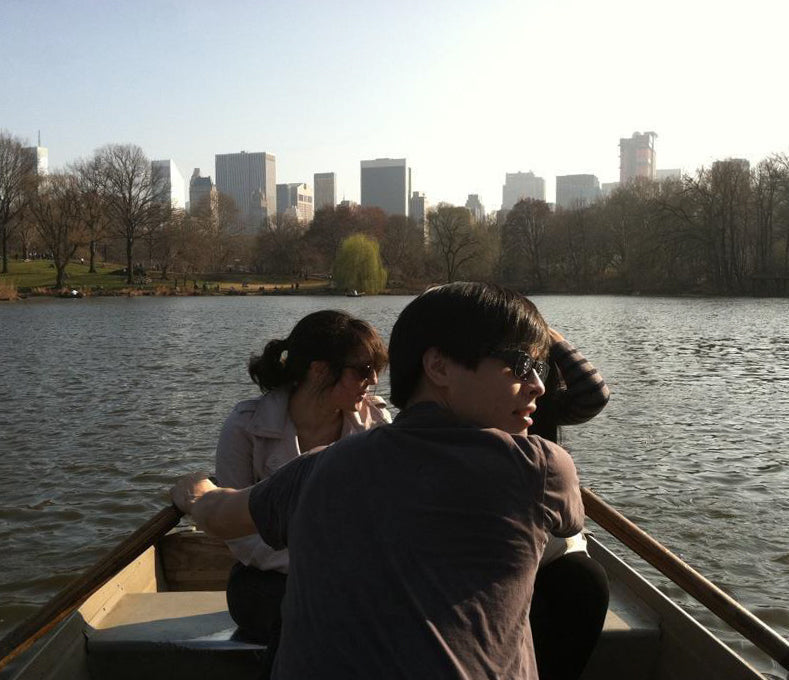 Nathan rows a boat in Central park.